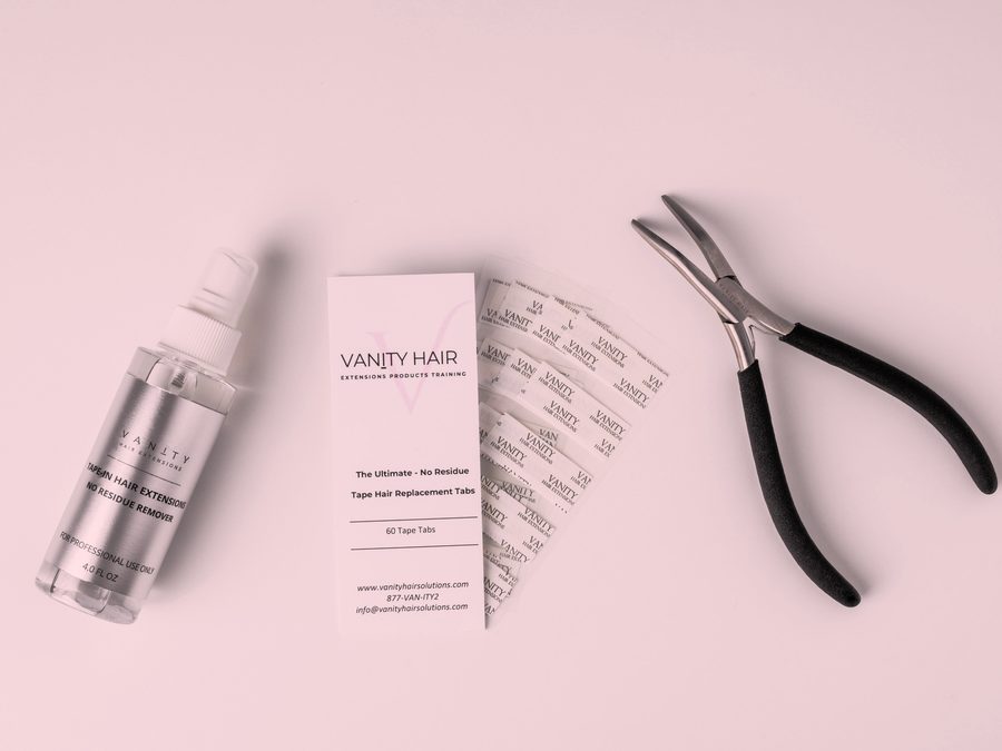 The full Vanity kit laid out — remover bottle, tab card and application pliers