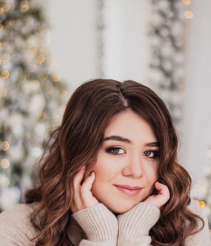 Chestnut brown hair styled in soft long layers